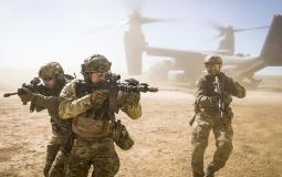 A_joint_special_forces_team_moves_together_out_of_an_Air_Force_CV-22_Osprey_aircraft,_Feb._26,_2018.jpg