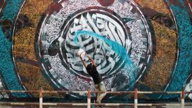 بعنوان "الروح التي تقاتل فينا".. الفنان الفلسطيني بلال خالد ينهي لوحة فنية بالرسم جرافيتي