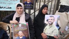 وقفة في مدينة البيرة للمطالبة باسترداد جثامين الشهداء المحتجزة