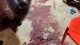 آثار الدمار والدماء في مكان اغتيال عدد من الشبان في مخيم عقبة جبر بأريحا