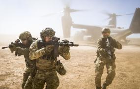 A_joint_special_forces_team_moves_together_out_of_an_Air_Force_CV-22_Osprey_aircraft,_Feb._26,_2018.jpg